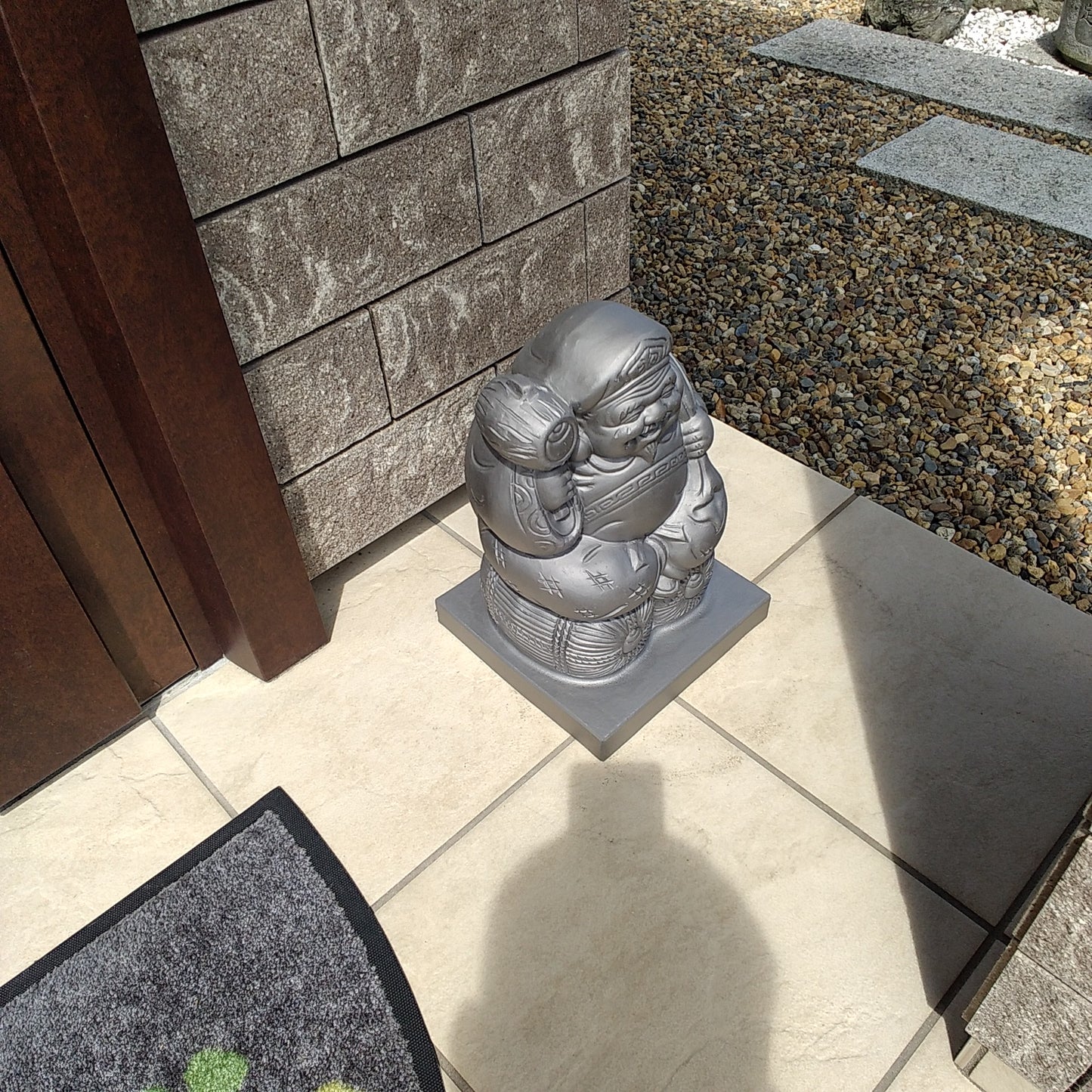 Japanese lucky god figure(Daikokuten) -Made of the ceramic-