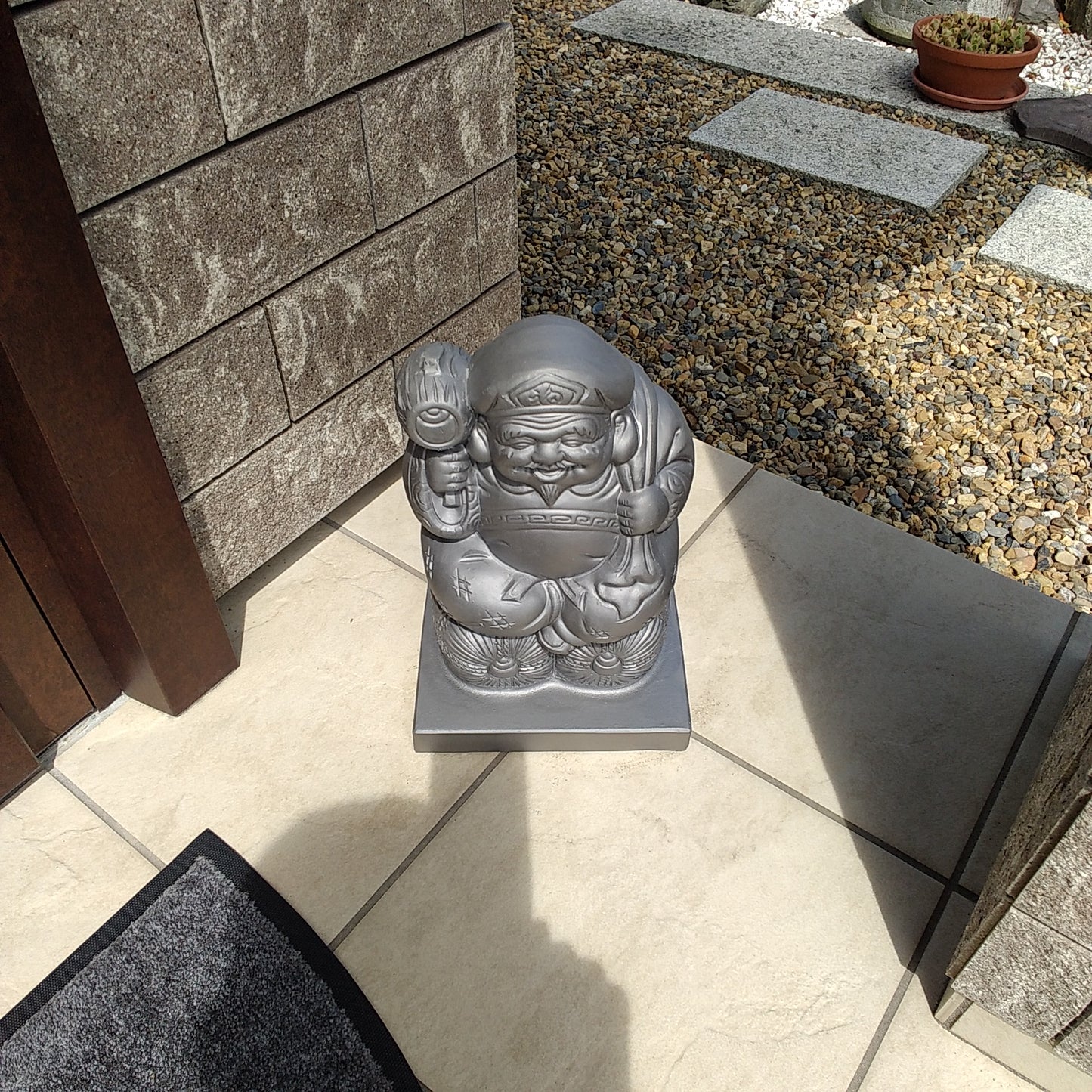 Japanese lucky god figure(Daikokuten) -Made of the ceramic-