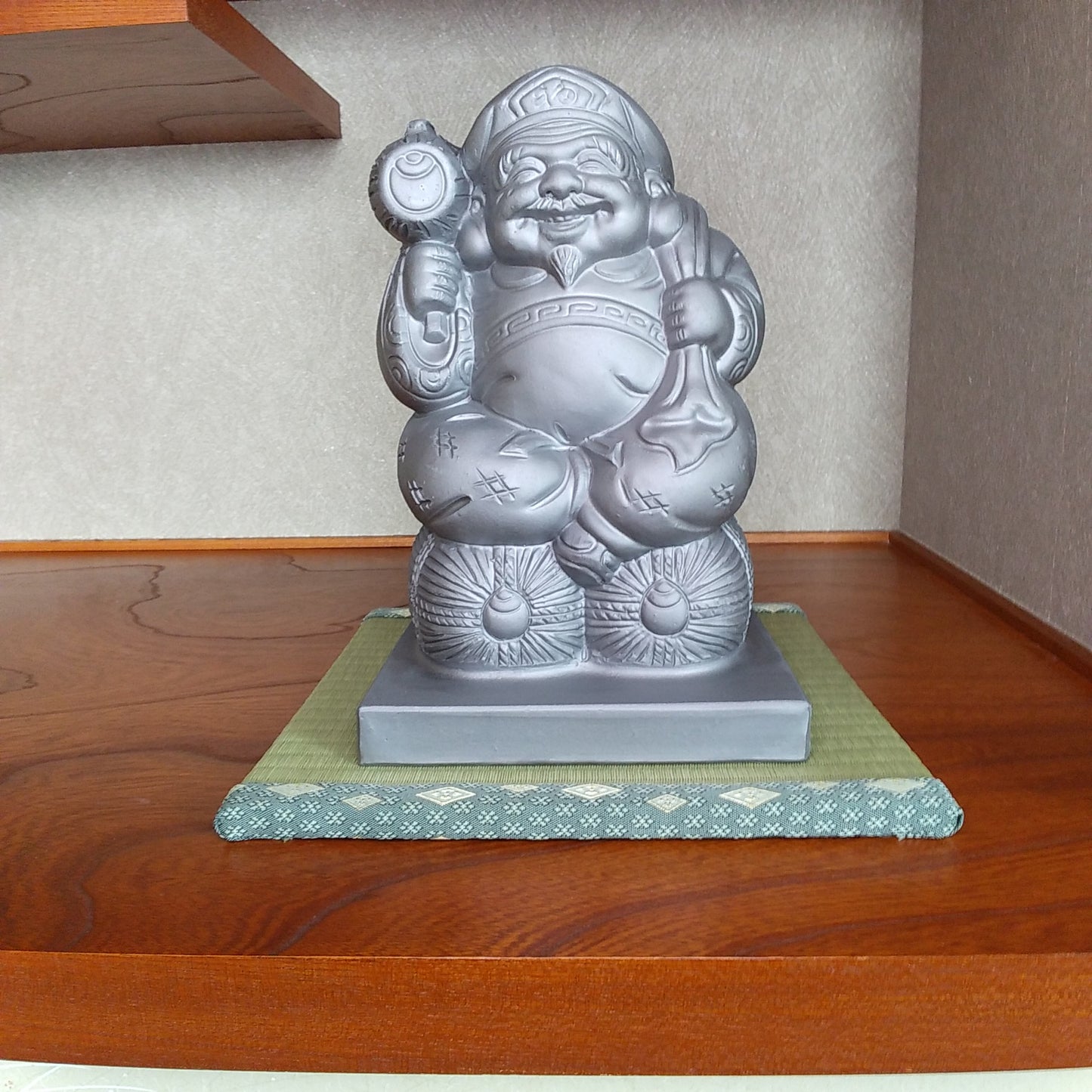 Japanese lucky god figure(Daikokuten) -Made of the ceramic-